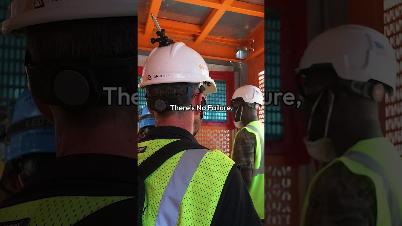iFieldSmart hardhat-branded construction workers on jobsite